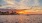 a sunset at a beach