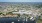an aerial view of the city with water